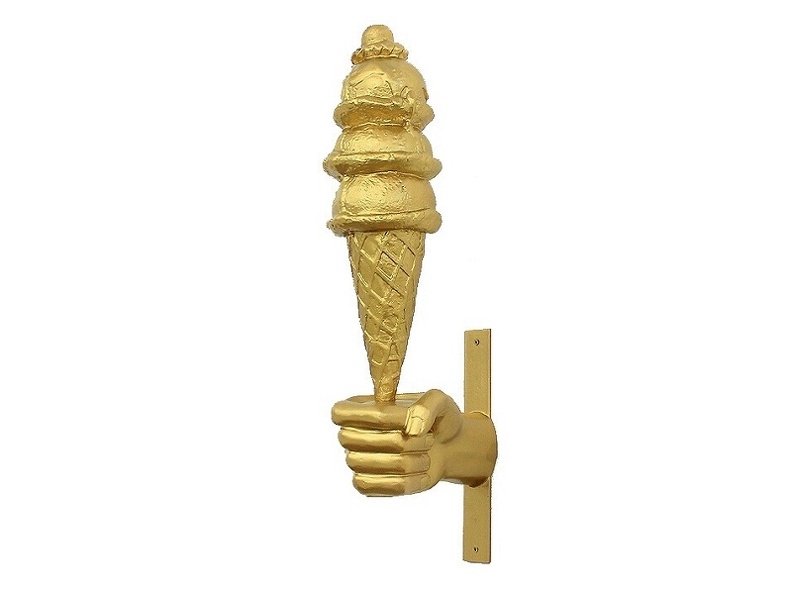JJ208_GOLD_ICE_CREAM_WITH_CREAM_CHERRY_IN_LARGE_GOLD_HAND.JPG
