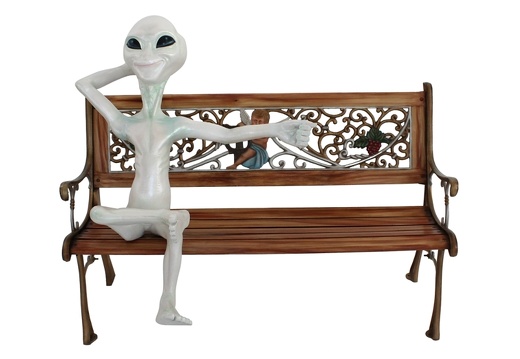 JJ5006 FUNNY ALIEN SITTING ON A BENCH WITH HIS ARM  OUT 1